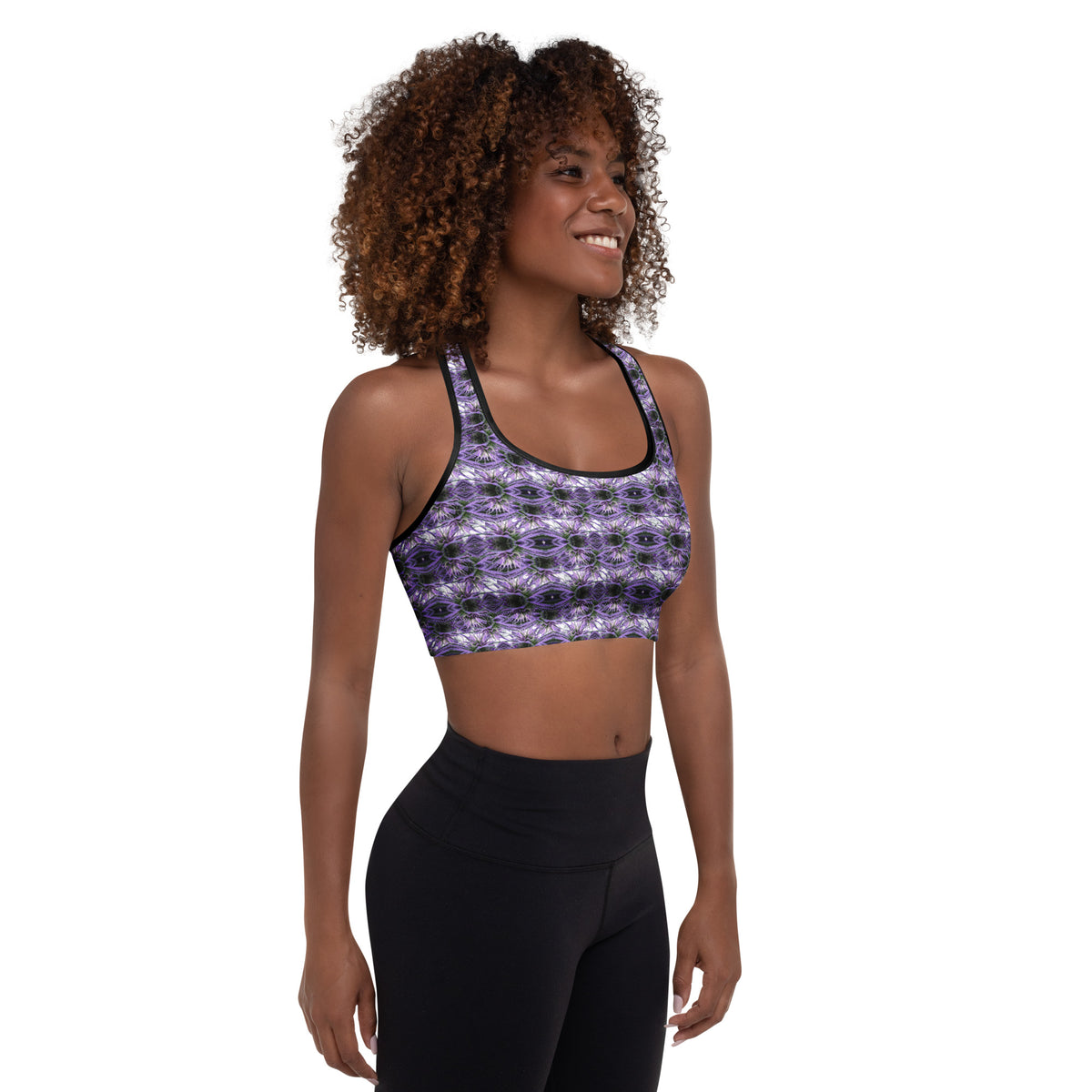 Black BudWear sports bra with all-over print and padding, featuring a stylish cut-sew design for activewear and comfort.