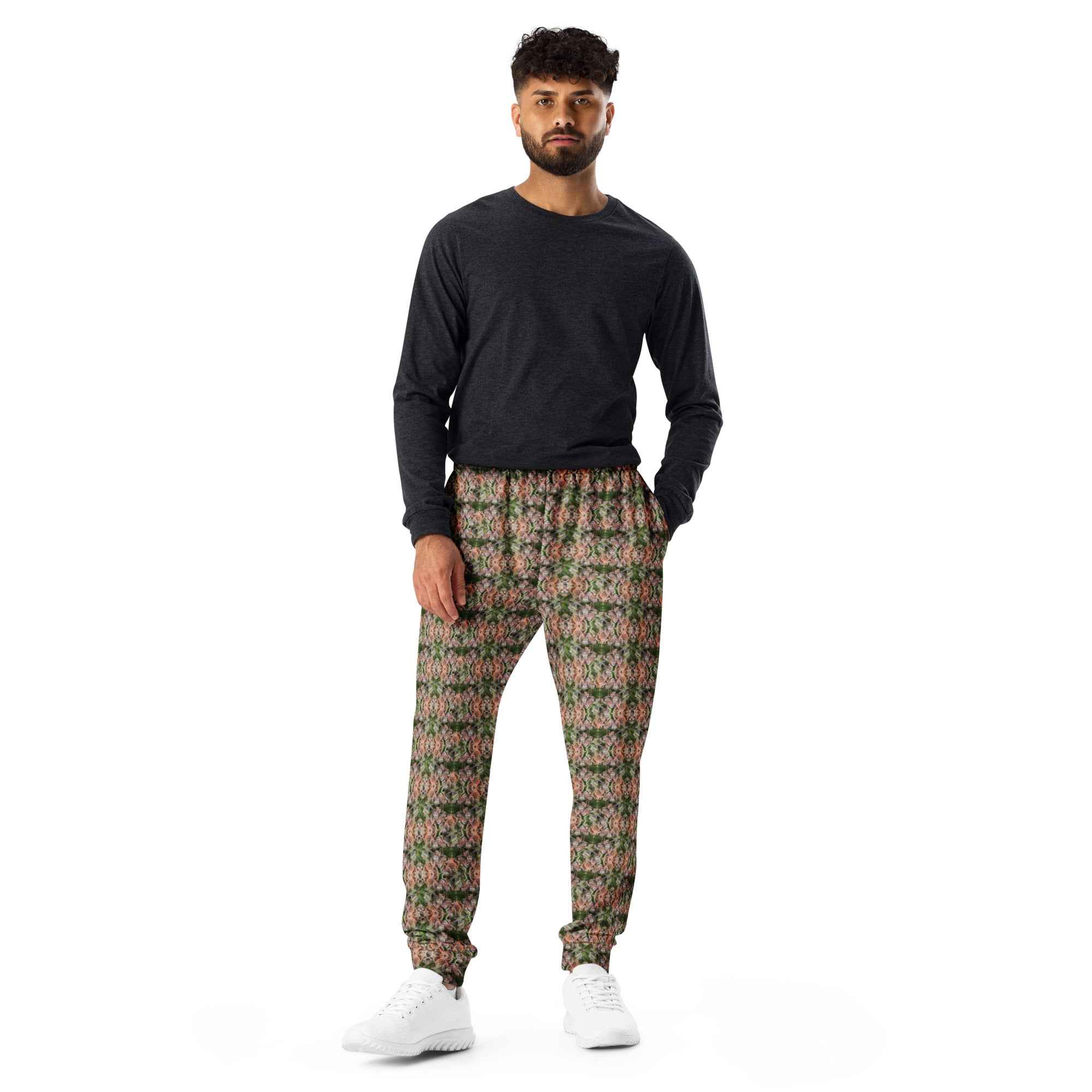 Men's brown cannabis print joggers by BudWear featuring all-over recycled weed leaf pattern on white fabric.
