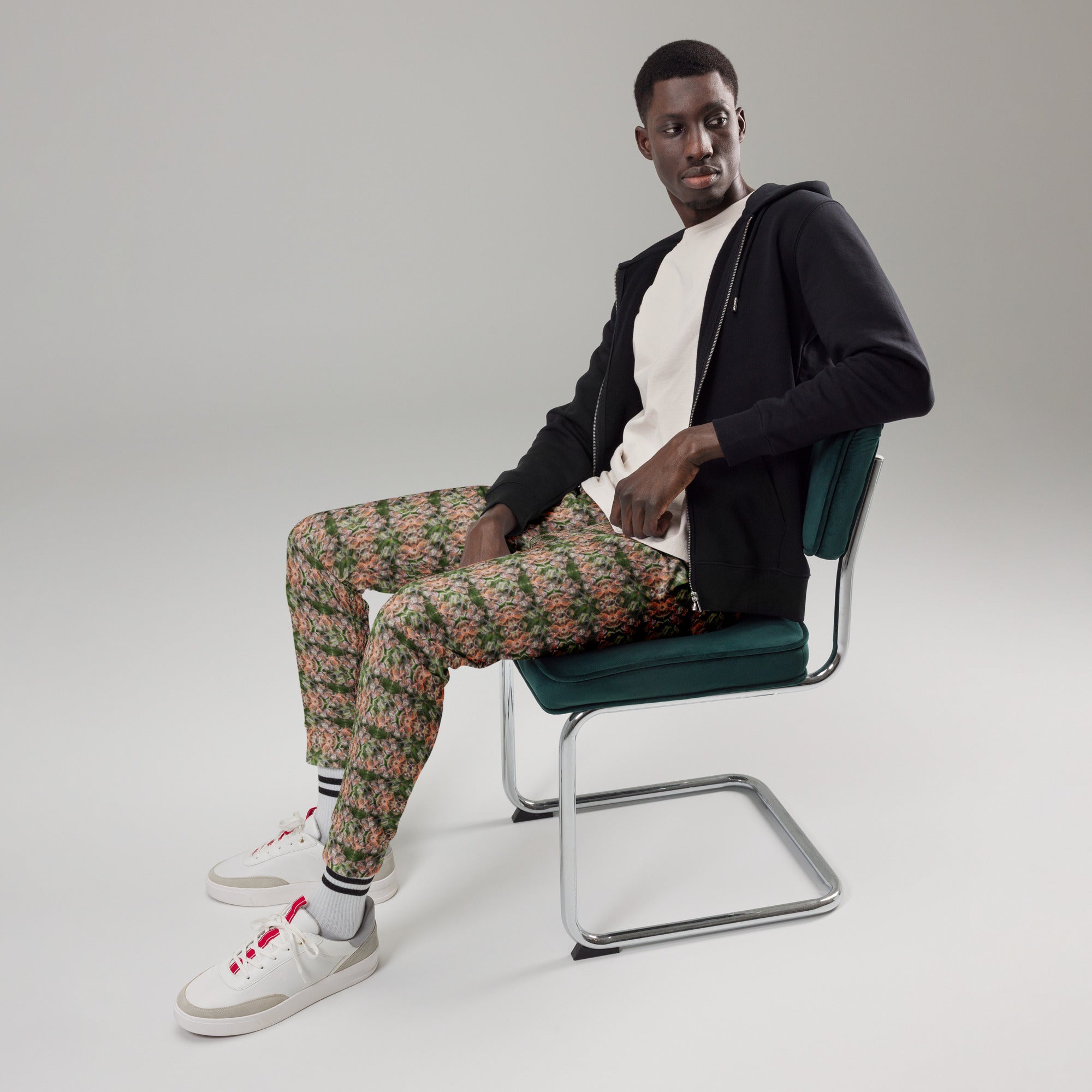 Men's brown cannabis print joggers by BudWear featuring all-over recycled fabric design and comfortable cut-sew style.