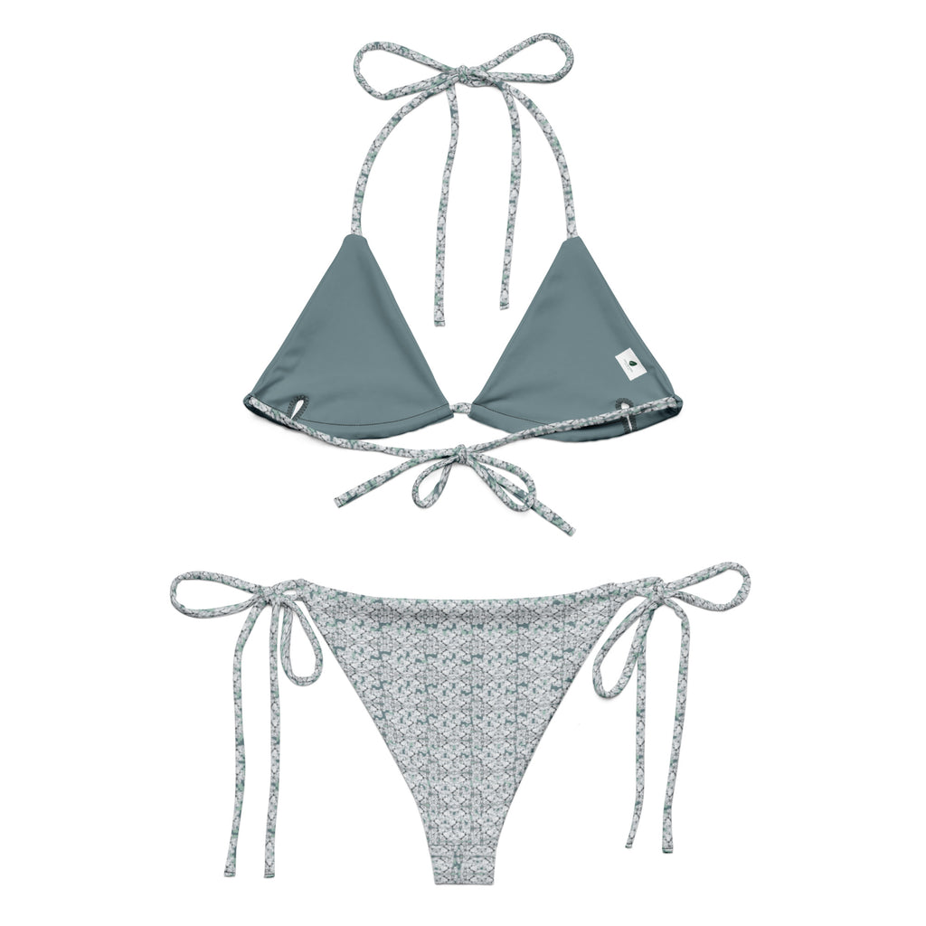 All-over white recycled string bikini from Fancy Canna-buds showing the back view with a cut-sew design and vibrant print pattern.