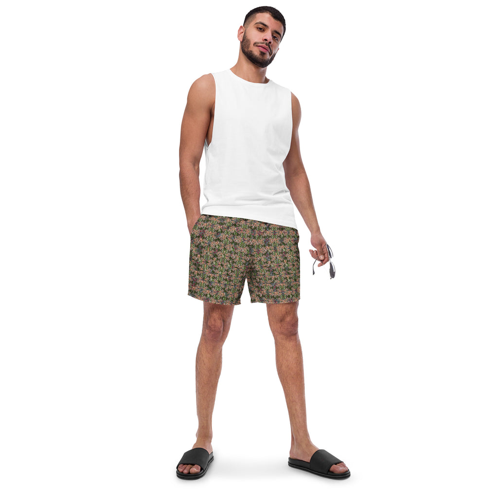 Buddy Swim Trunks by BudWear featuring all-over recycled print, white front view with vibrant aquatic design.