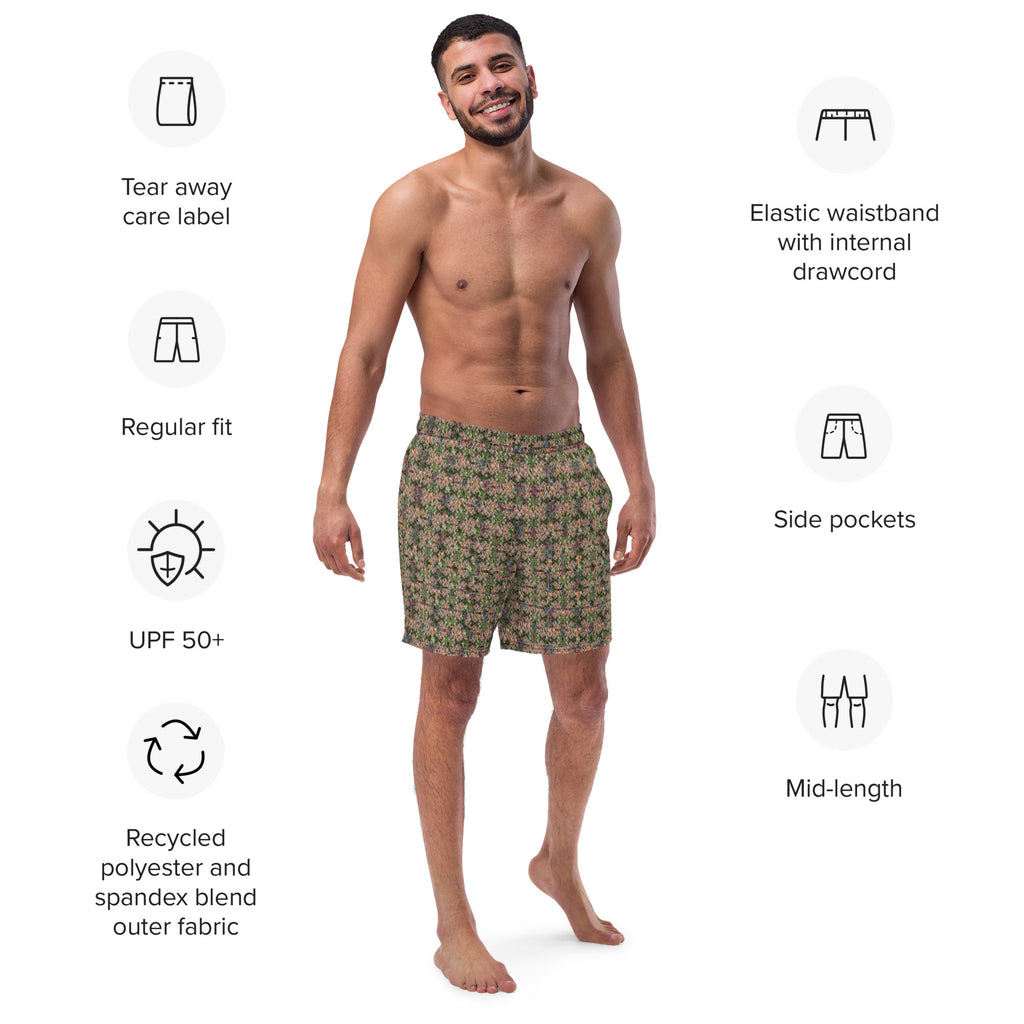 Buddy Swim Trunks by BudWear featuring a vibrant all-over print on recycled white fabric, front view of the swim trunks.
