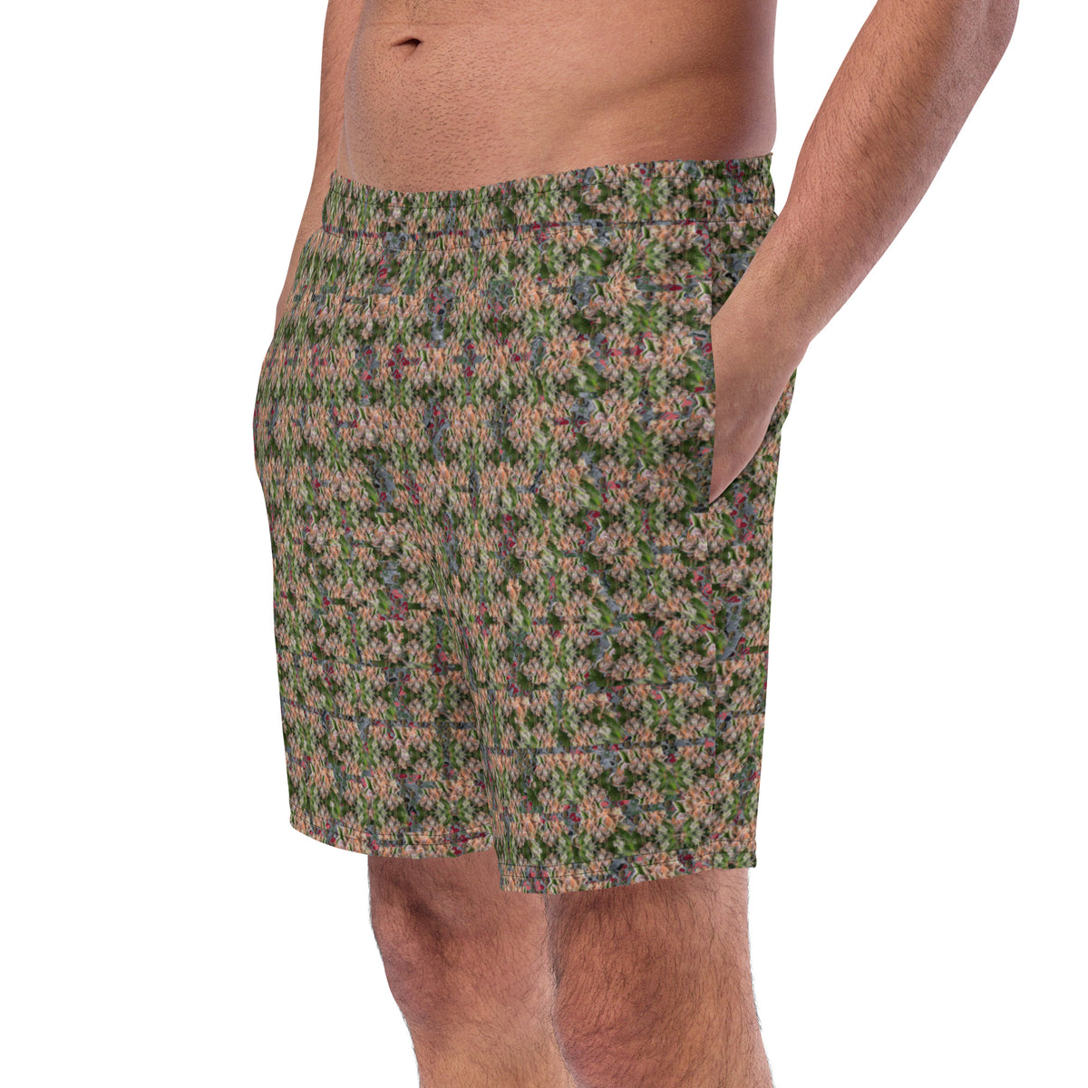 Men's Cannabis Print Swim Trunks by BudWear featuring all-over green cannabis leaf design on white recycled fabric.