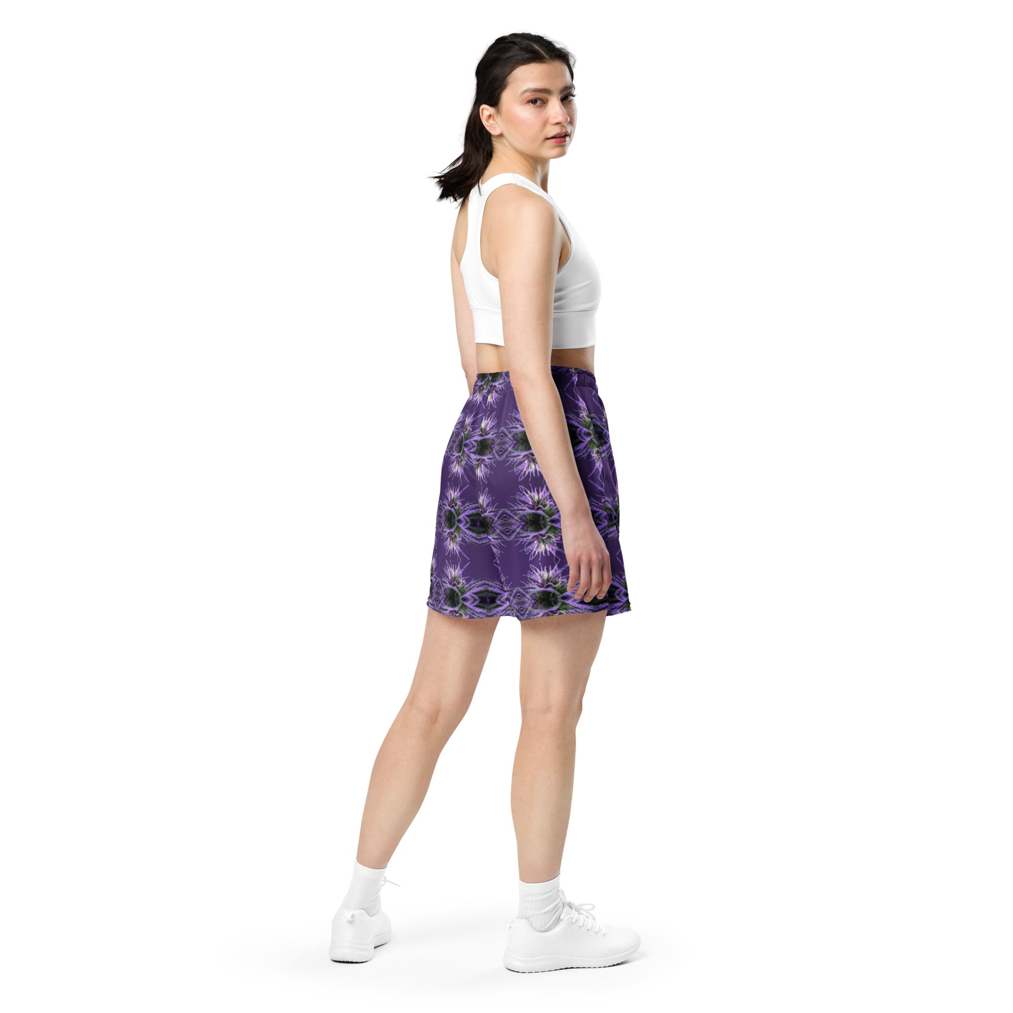 Unisex purple mesh shorts with all-over print from BudWear, showing a back view with recycled fabric design.