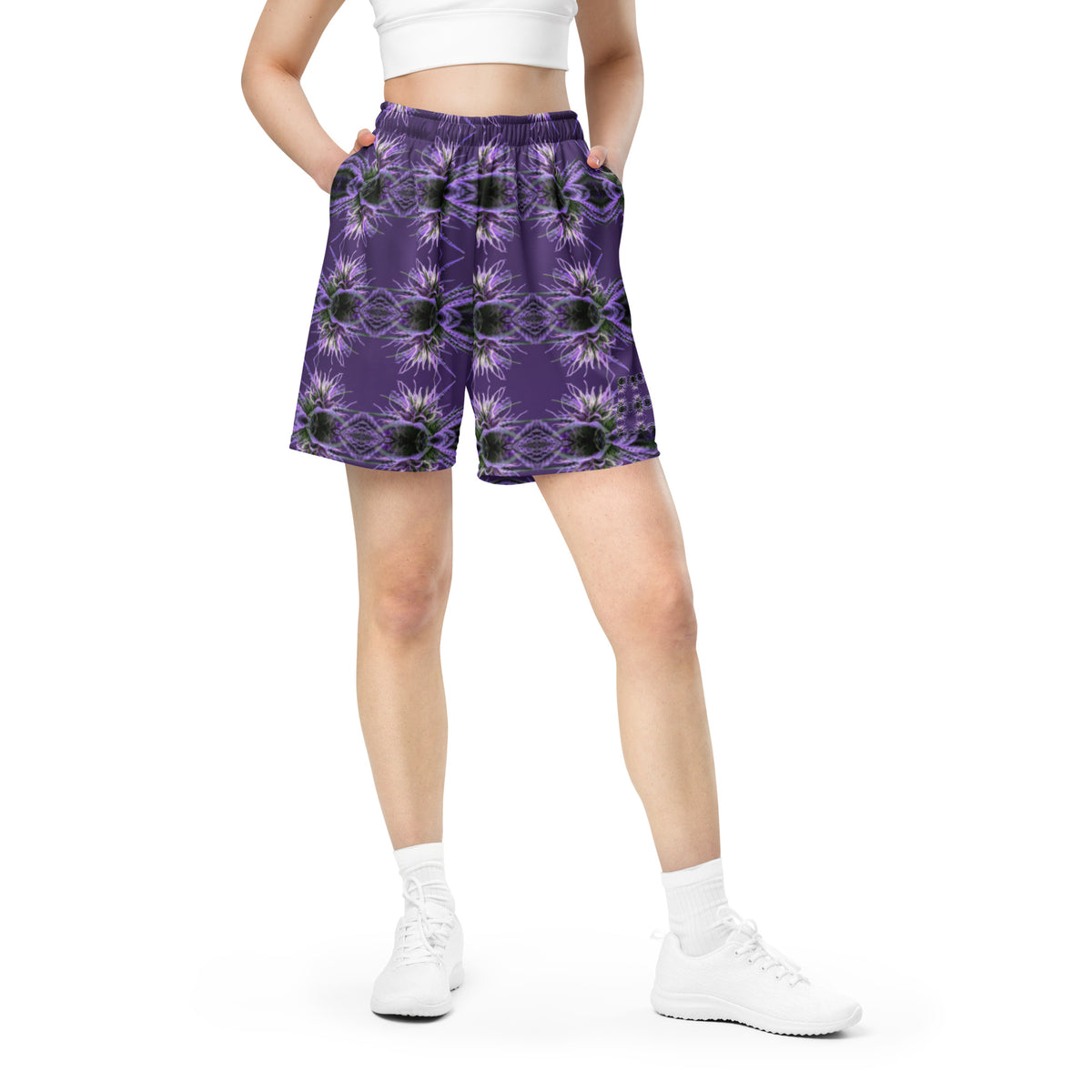 Unisex mesh shorts by BudWear with all-over recycled print, white color, front view showing lightweight, breathable fabric.