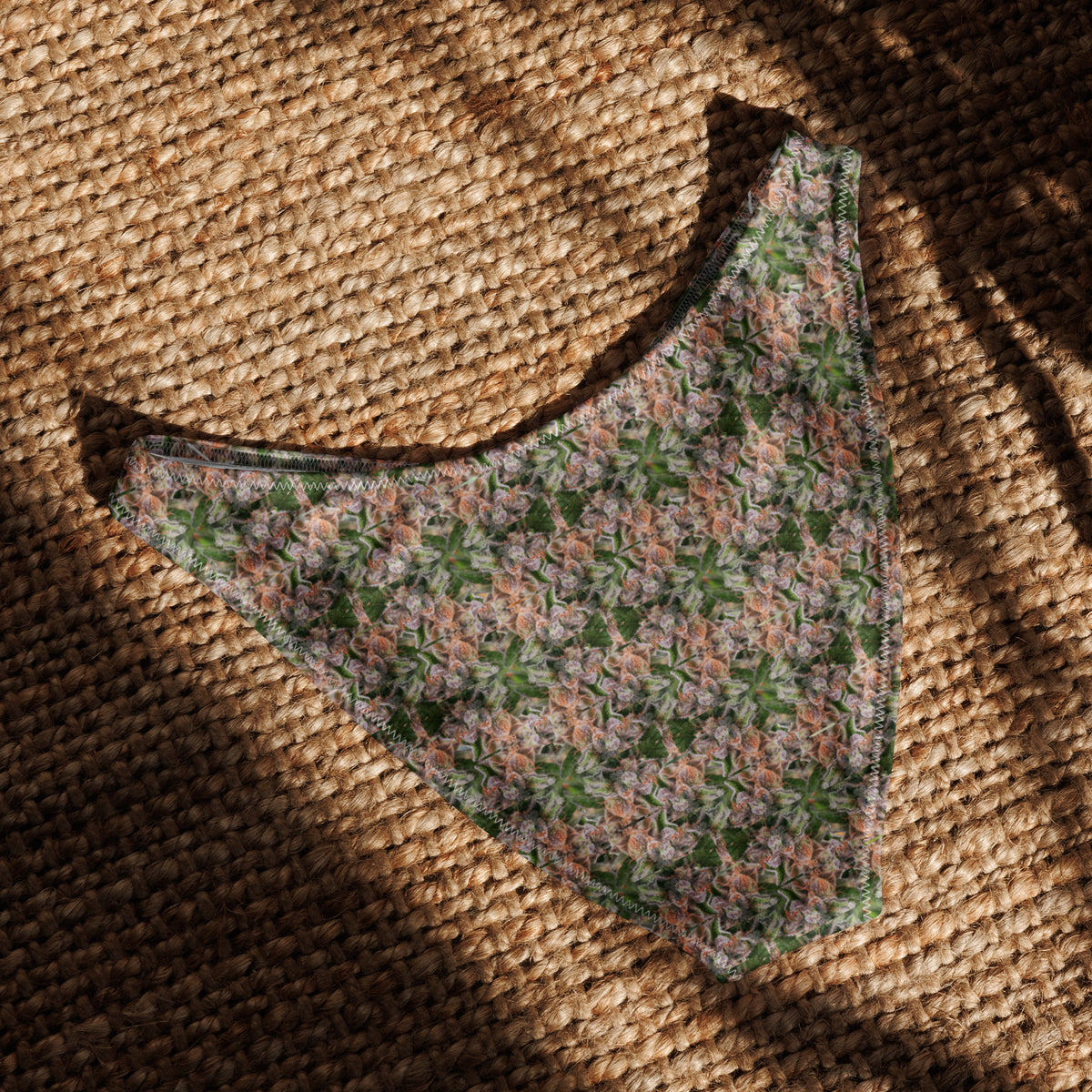Recycled V-cut bikini bottom by BudWear with all-over white print, showcasing front and back view in a cut-sew style.