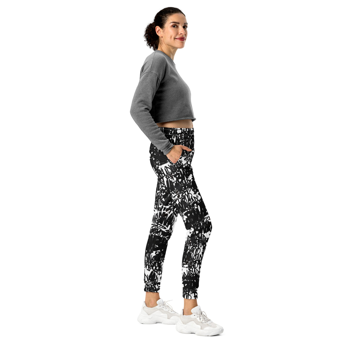 All-over print recycled women’s joggers from BudWear, white cut-sew with signature design and comfortable fit.