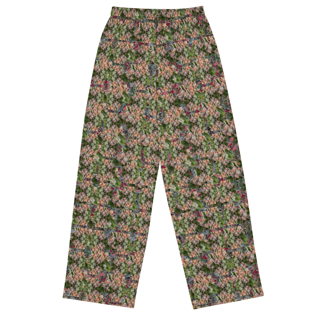 Unisex white wide-leg CUT-SEW pants with all-over floral print by BudWear, back view showcasing relaxed fit and detailed design.