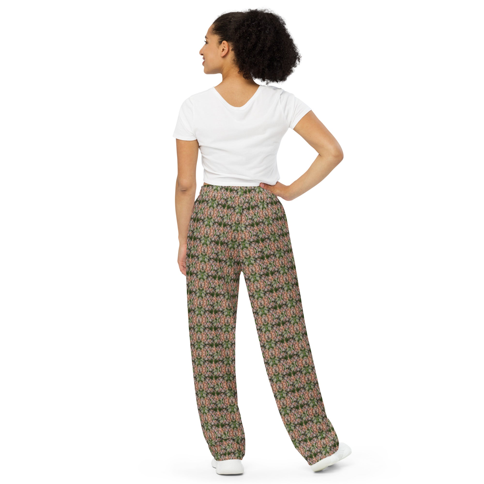 Unisex wide-leg pants with all-over floral print in white, featuring cuffs and buds design from BudWear.