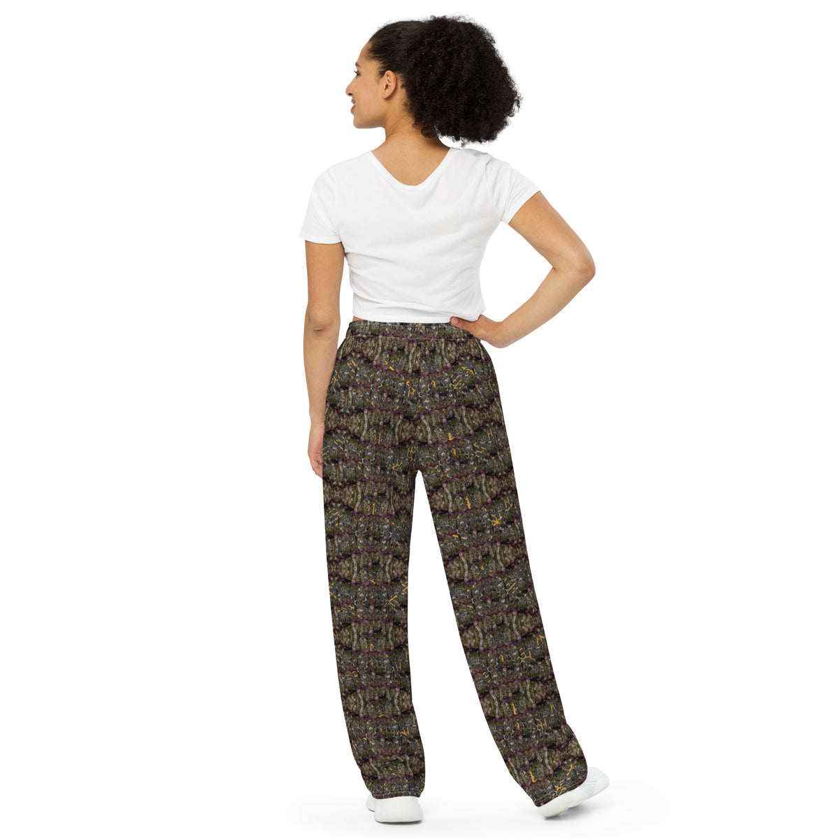 Unisex white wide-leg pants with all-over cannabis print by BudWear, featuring a relaxed fit and stylish design.