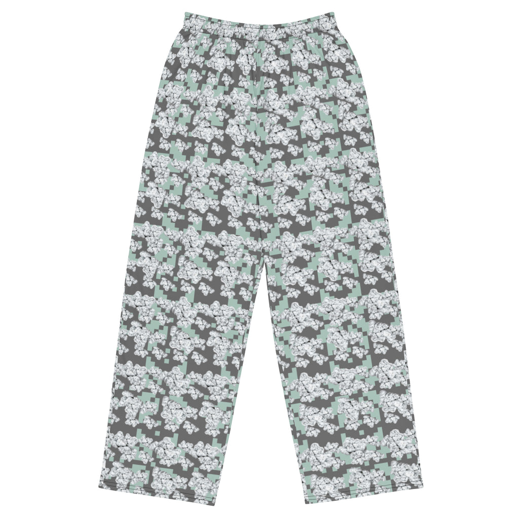 Unisex white Snow-bud wide-leg pants by BudWear featuring an all-over colorful print, front view with relaxed fit.