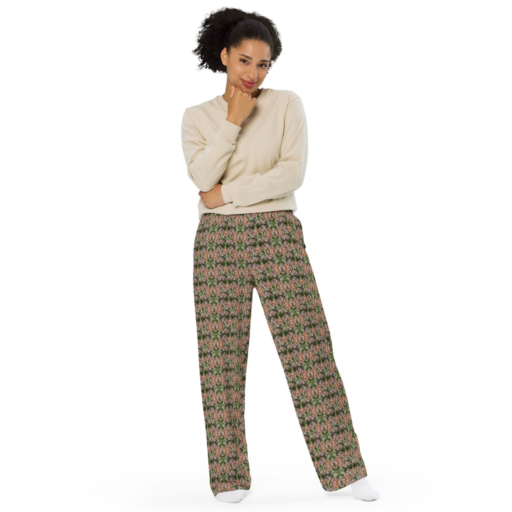 Unisex wide-leg pants by BudWear with white all-over print, featuring a relaxed fit and stylish cuffed design.