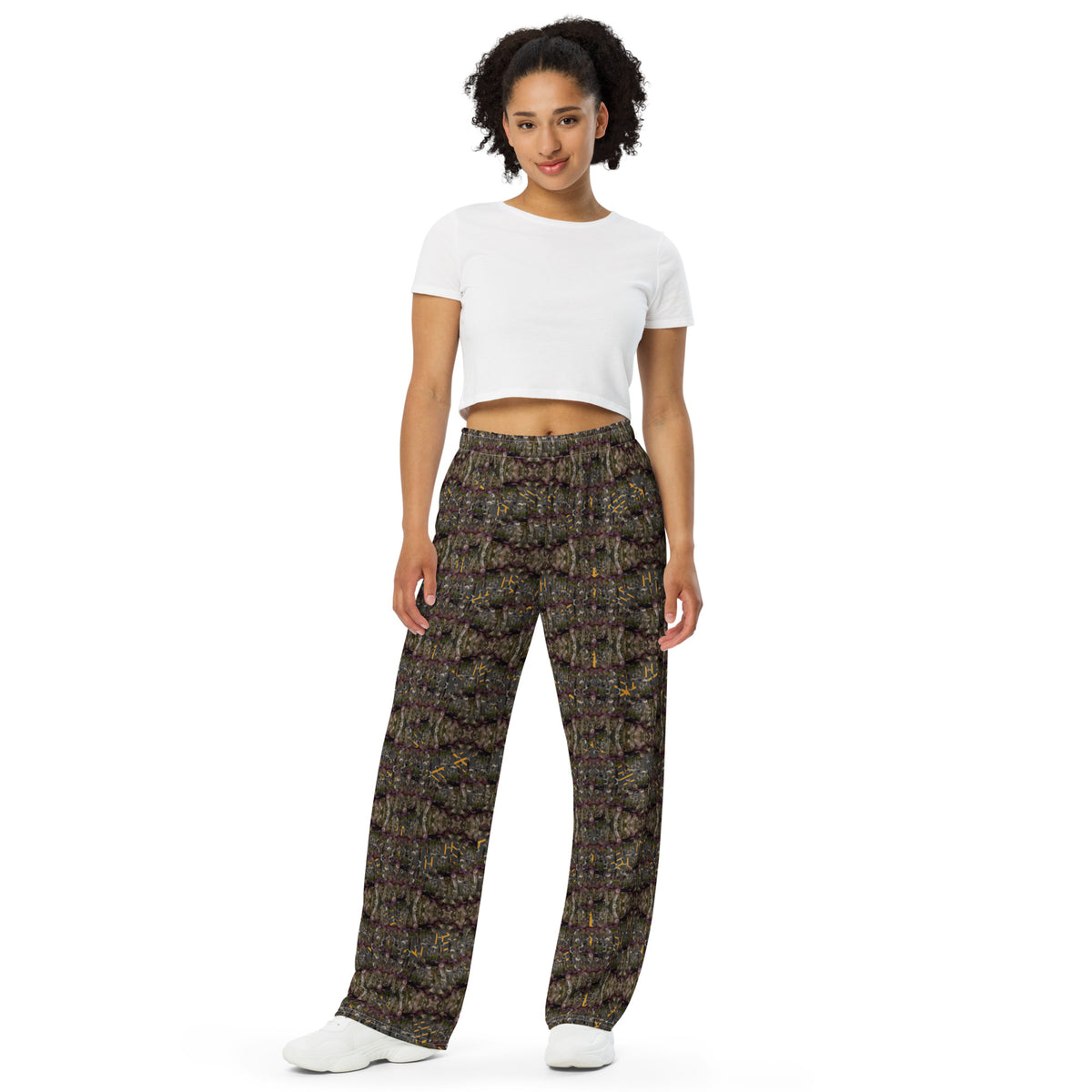 Unisex white wide-leg pants with all-over cannabis print by BudWear, featuring a relaxed fit and stylish design.