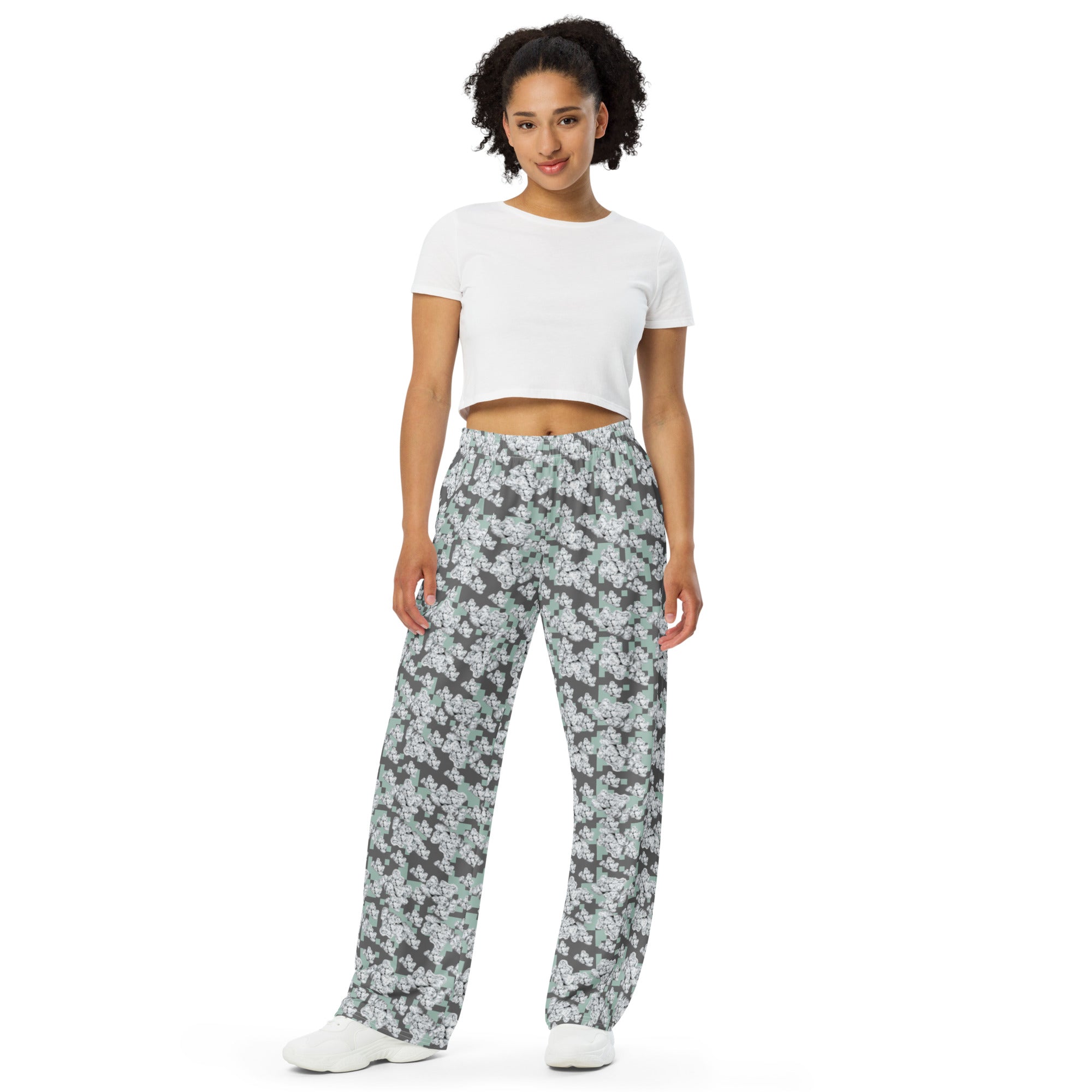 Unisex white wide-leg pants from BudWear with all-over print, featuring a relaxed fit and casual streetwear style.