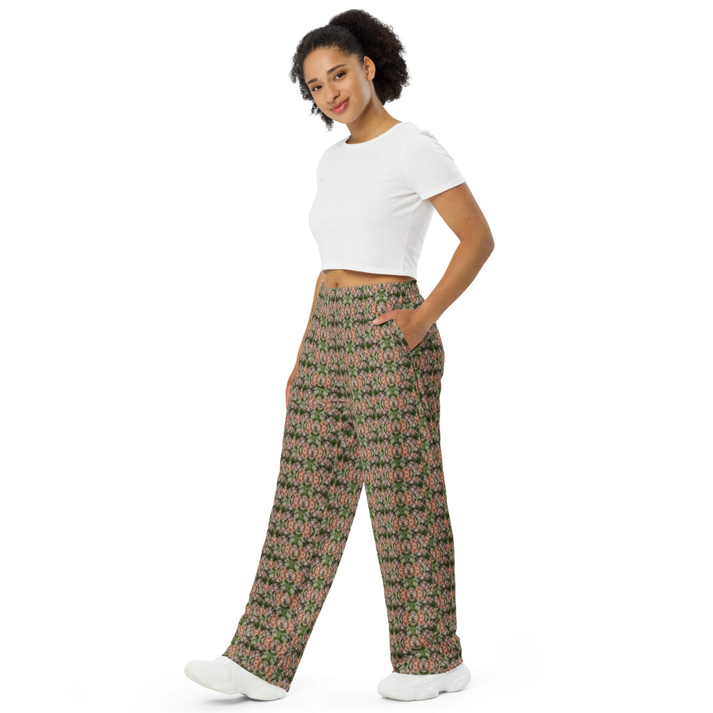 All-over print unisex wide-leg pants from BudWear featuring cuffs and buds design in white, front view.