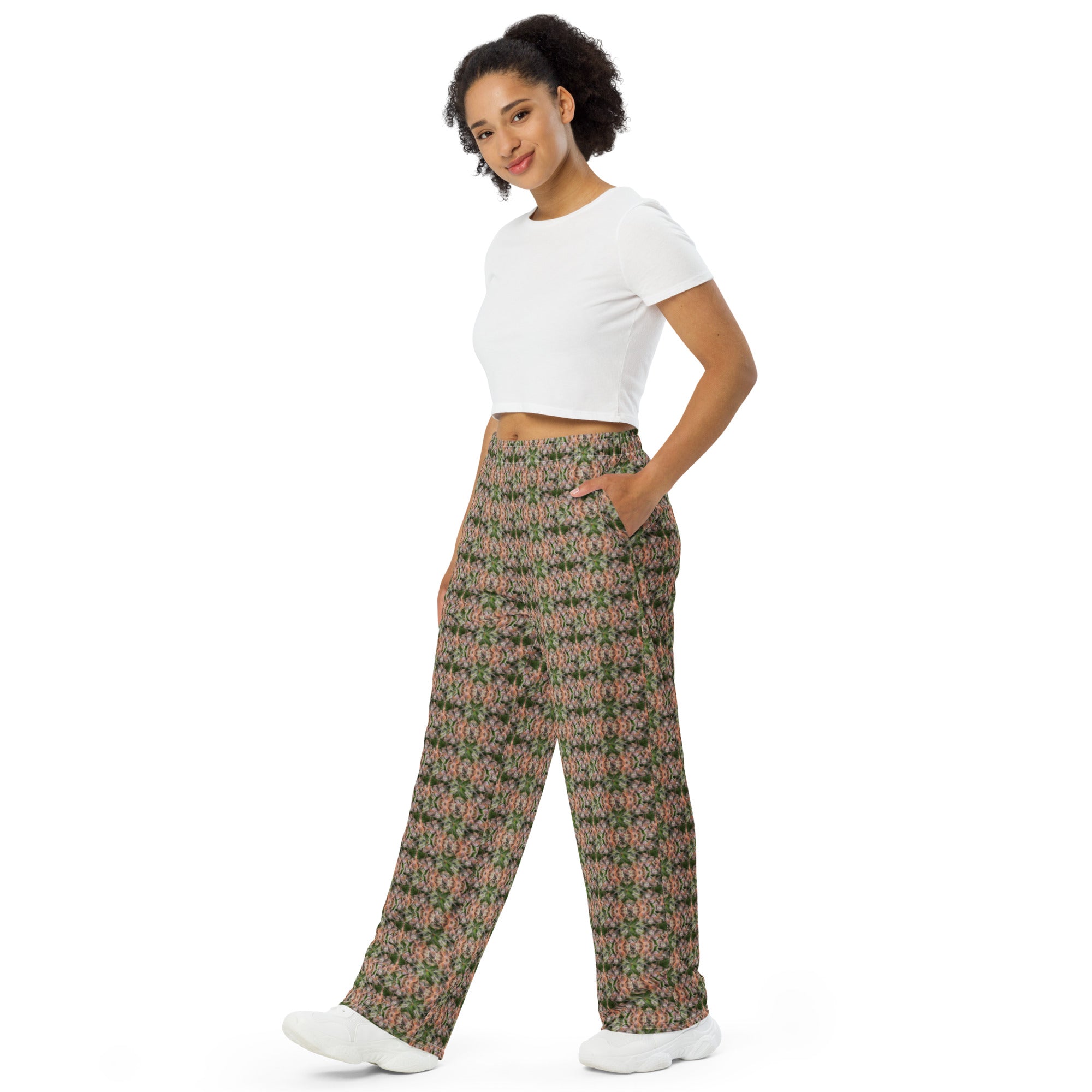 All-over print unisex wide-leg pants from BudWear featuring cuffs and buds design in white, front view.