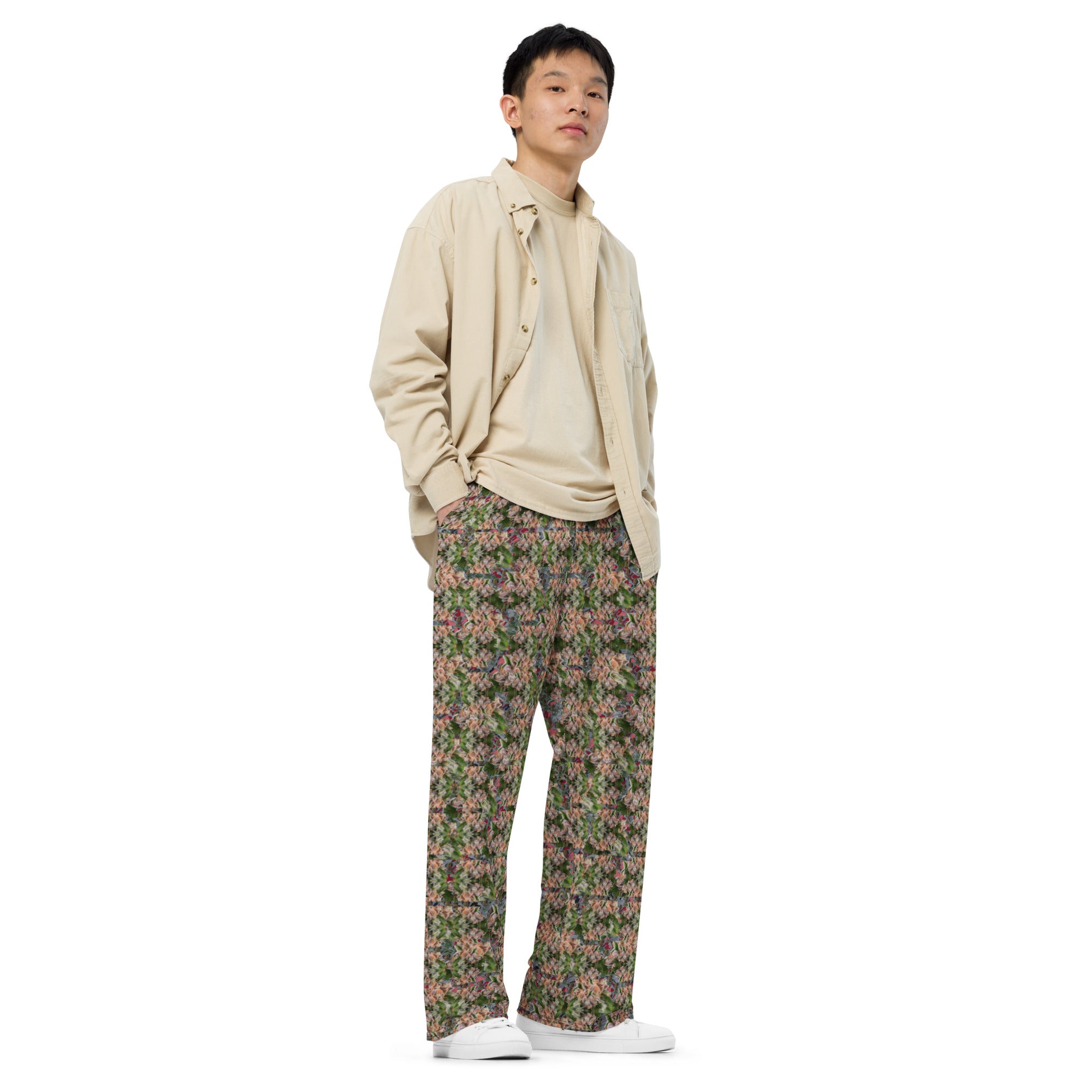 Unisex white wide-leg CUT-SEW pants with all-over printed design by BudWear, shown from the right front view.