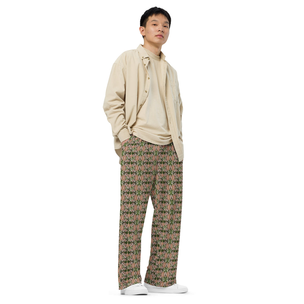 Unisex wide-leg pants with all-over floral print from BudWear, featuring a relaxed fit and white background.