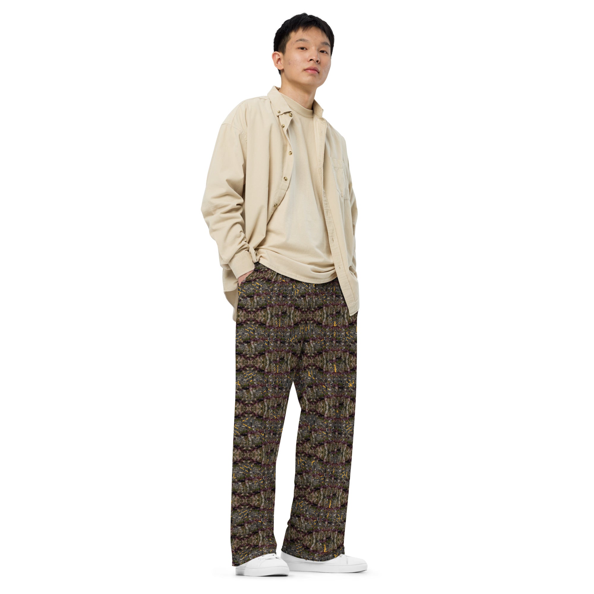 Unisex white wide-leg pants with all-over cannabis print by BudWear, front view showing relaxed fit and bold design.