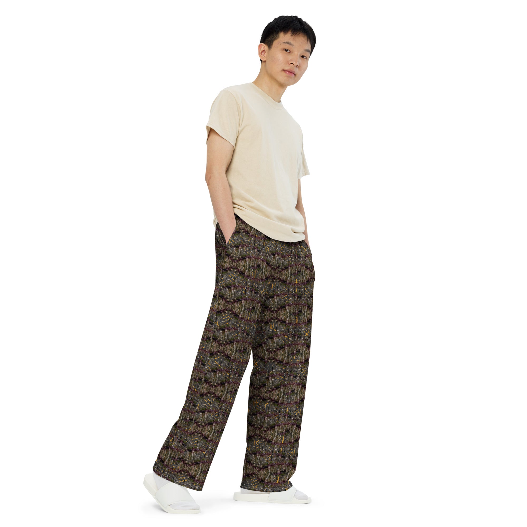 Unisex wide-leg pants by BudWear with an all-over white print, shown from the front right side. Comfortable and stylish fit.