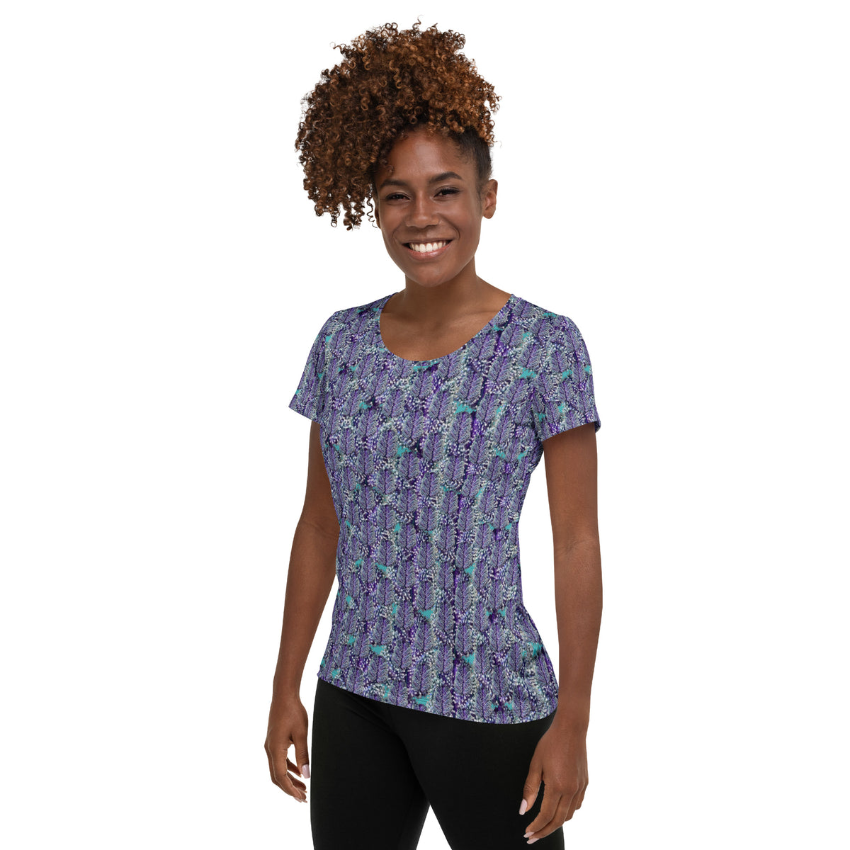 Women's white athletic tee with colorful cannabis print by BudWear, featuring a fitted design and breathable fabric.