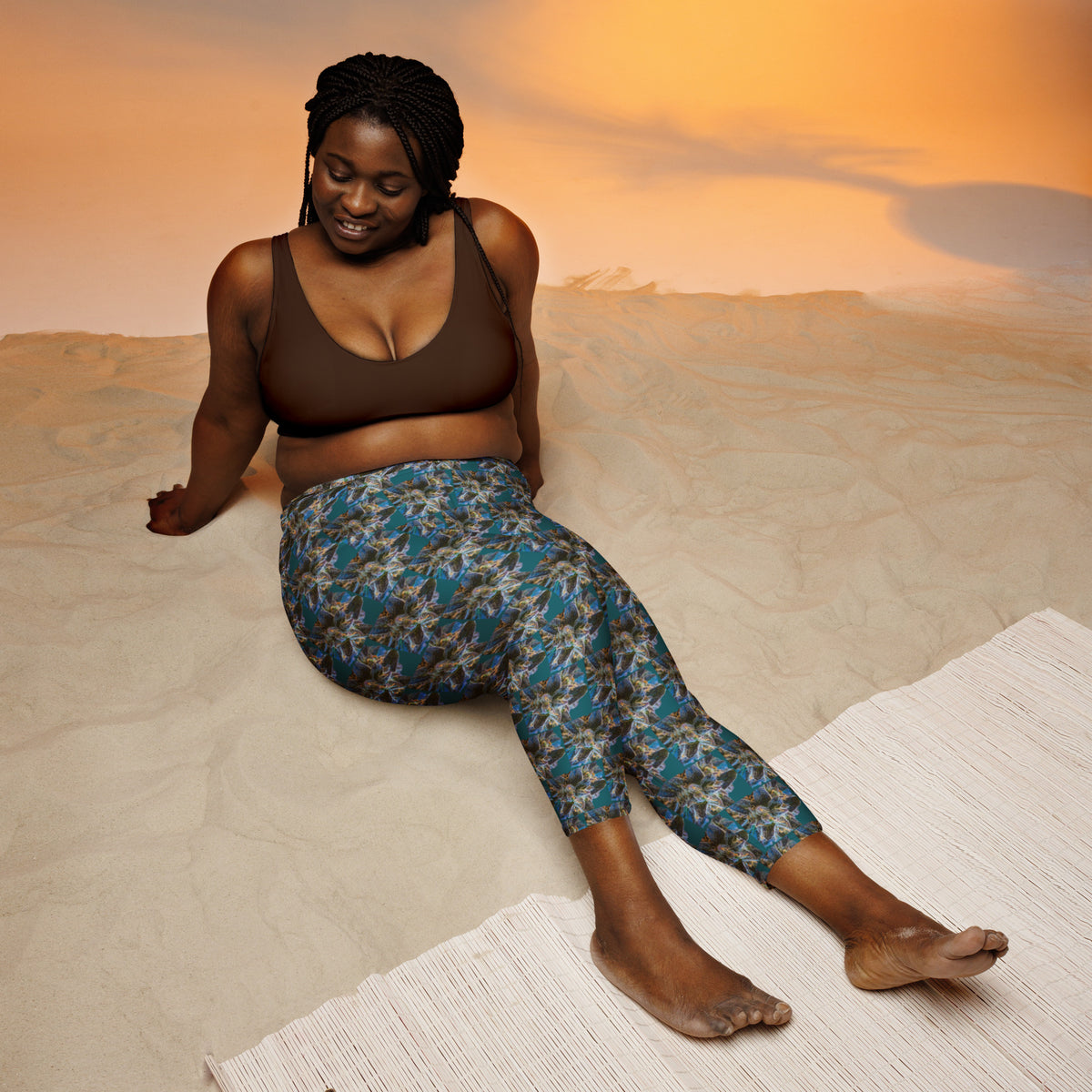 Blue-bud yoga Capri leggings by BudWear with all-over white print, fitted design, and elastic waistband for comfortable movement.