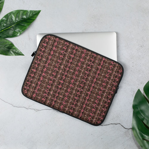 Canna-bud laptop sleeve by BudWear featuring sublimation design with cannabis leaf pattern on a protective fabric surface.