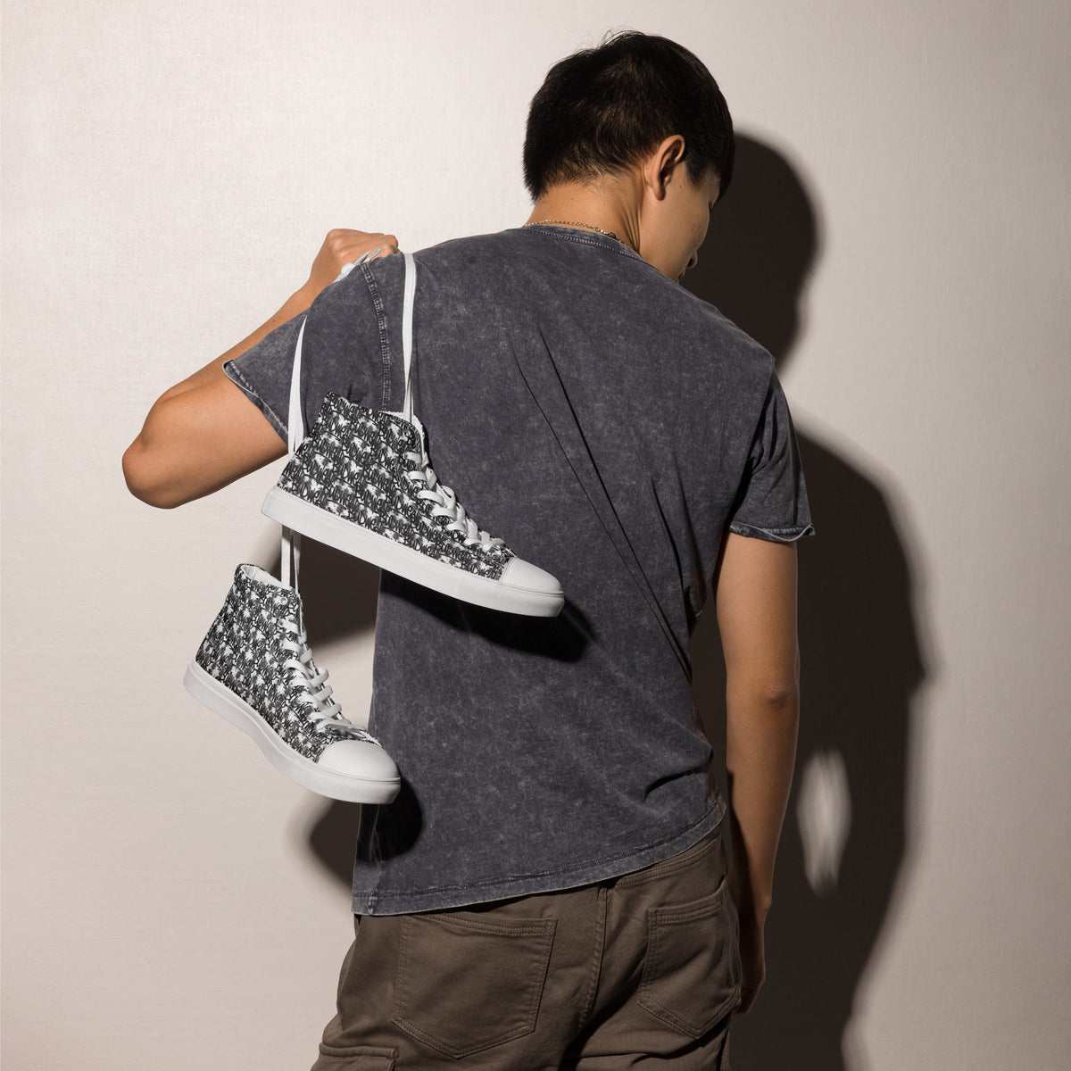 White high-top canvas shoes for men by BudWear, showcasing the stylish design and comfortable fit.