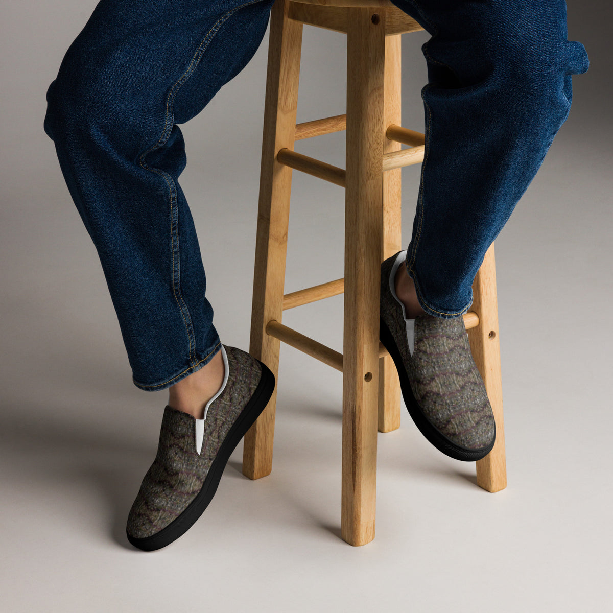 Black Tricoman Canvas Slip-On Shoes for men by BudWear featuring a stylish, comfortable design with a natural art-inspired pattern.