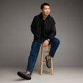 Men's black Tricoman Canvas Slip-On Shoes by BudWear, showcasing the comfortable slip-on design and stylish front view.