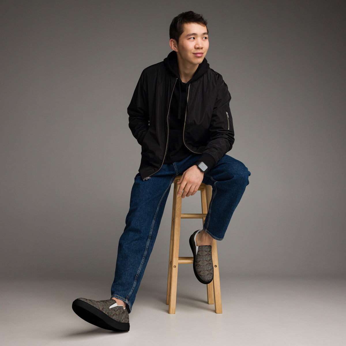 Black Tricoman Canvas Slip-On Shoes for men by BudWear, featuring a stylish front view showcasing comfortable, casual footwear.