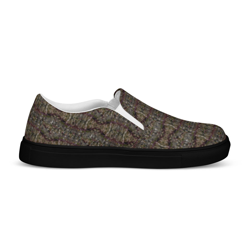Men's black Tricoman Canvas Slip-On Shoes by BudWear, showing the inside left view with natural art-inspired design and comfortable fit.