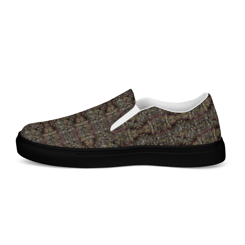 Black men's Tricoman Canvas Slip-On Shoes by BudWear, showing the left outside view with a sleek, comfortable design.