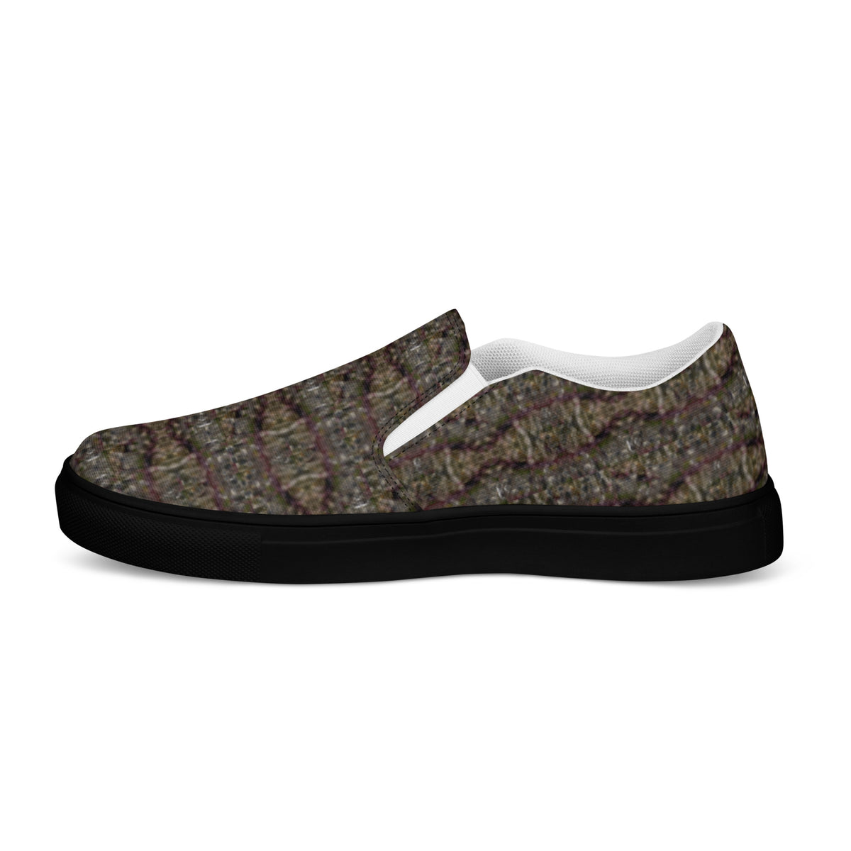 Men's black Tricoman Canvas Slip-On Shoes by BudWear, shown from the outside left side, featuring a comfortable and stylish design.
