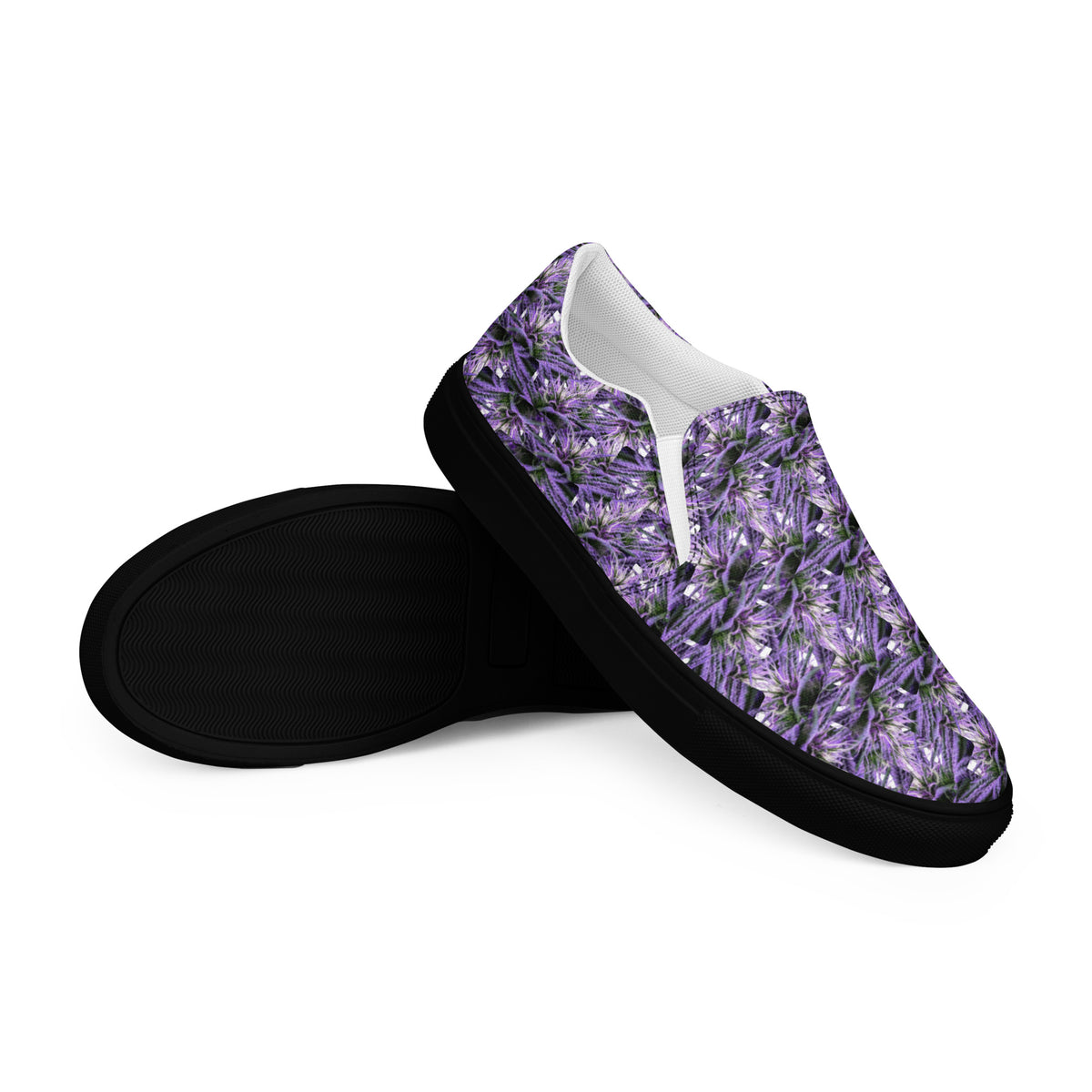 Black men's slip-on canvas shoes by Bud Wear, shown from the front right angle with clean design and comfortable fit.