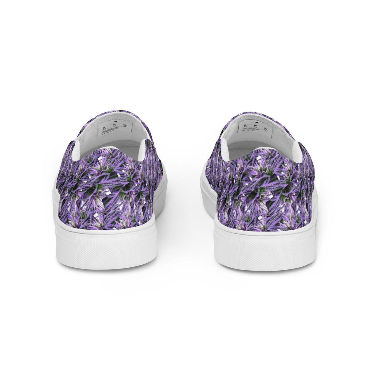 Men’s white slip-on canvas shoes by Bud Wear, shown from the back with a clean, casual design and comfortable fit.