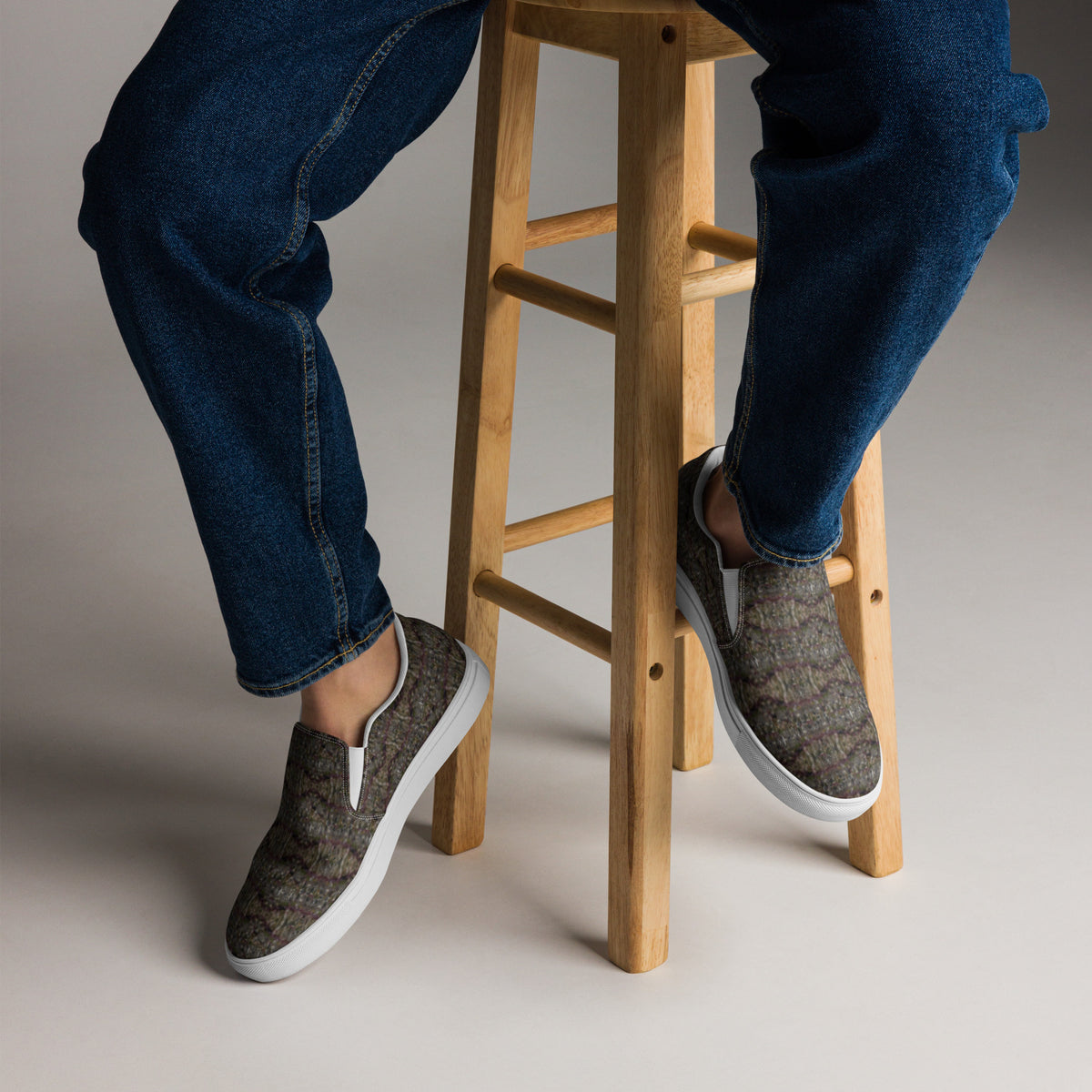 White men's Tricoman Canvas Slip-On Shoes by BudWear, featuring a clean front view with natural art-inspired design.