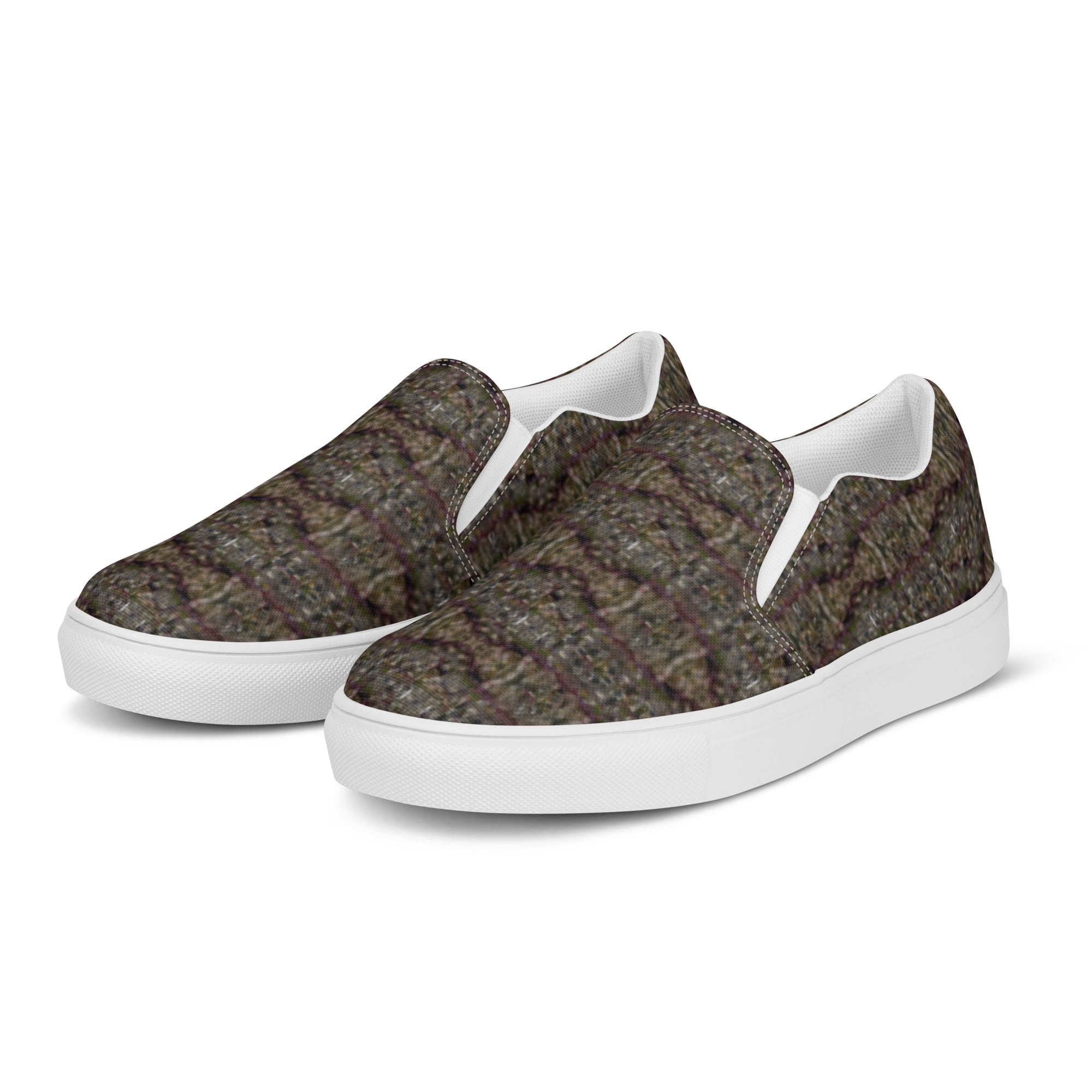 Men's white Tricoman Canvas Slip-On Shoes by BudWear, shown from the front left side with a clean, stylish design.